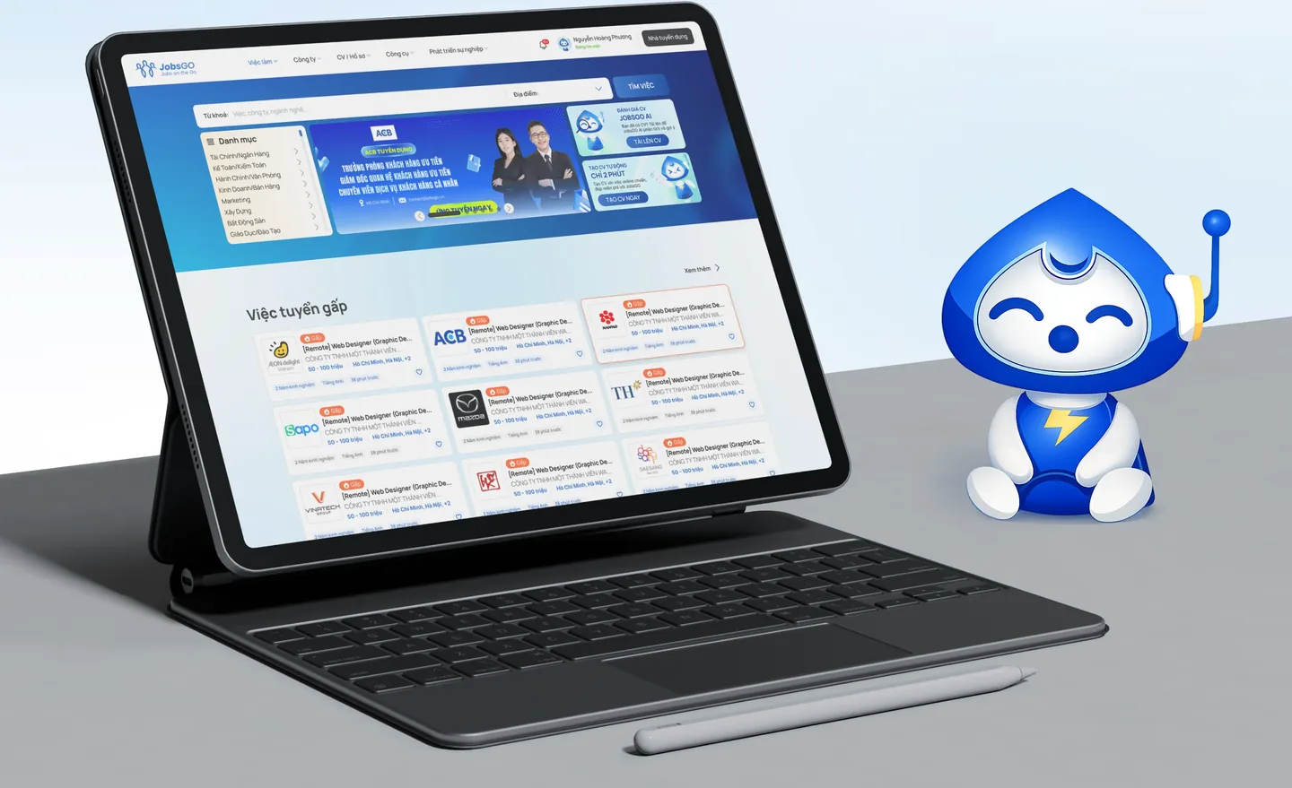 Trang chủ web JobsGO trên máy tính bảng: thanh tìm kiếm, danh mục ngành nghề, banner và mục Việc tuyển gấp, cạnh linh vật JobsGO.